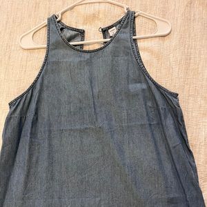 Soft denim sleeveless top with a keyhole back.